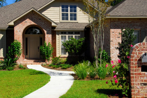 Attractive brick home and landscaping