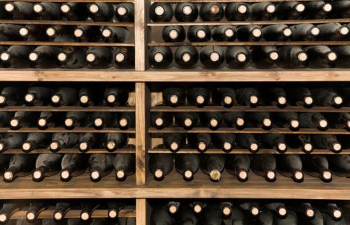 Rack full of vintage bottles of wine